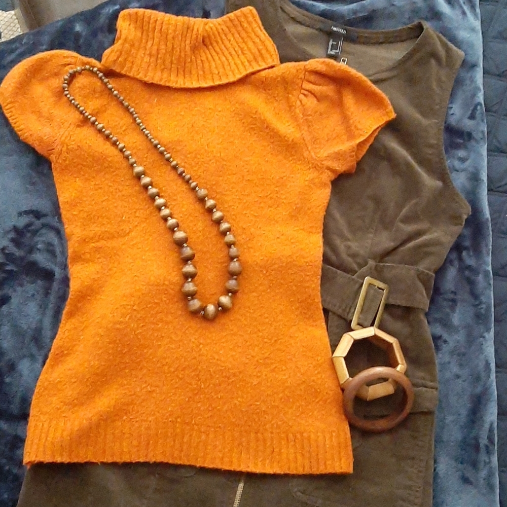 Orange turtleneck sweater